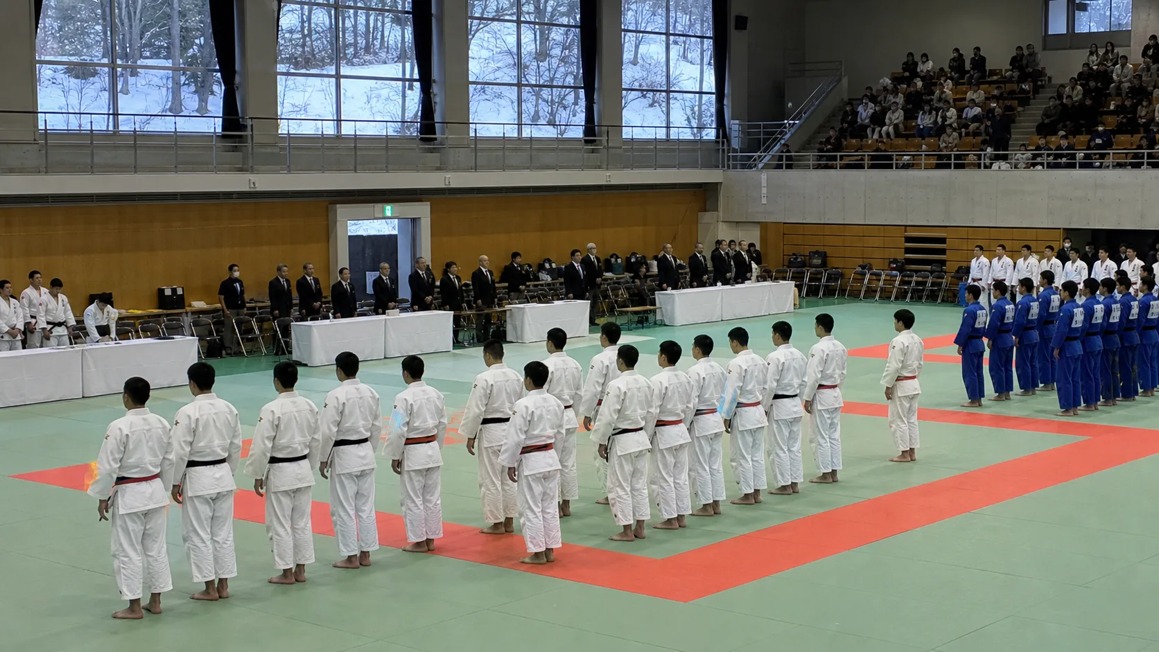 Editorial image for Japan National Sports Festival judo with athletes lining up in a regional sports hall