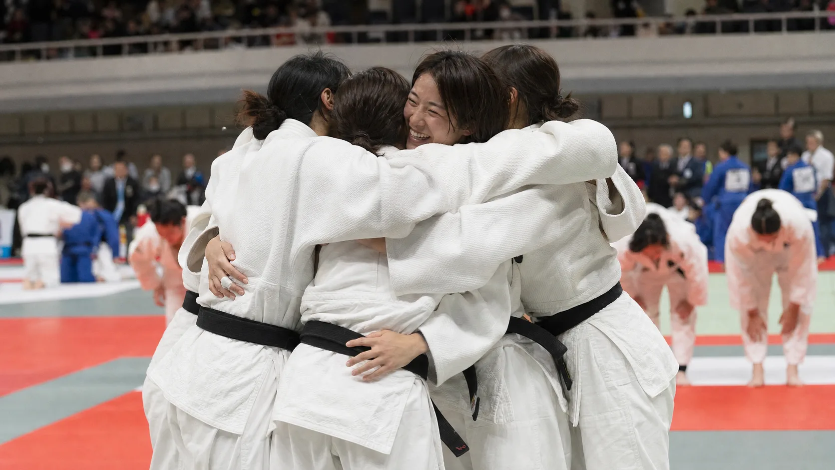 Editorial women corporate judo team image after a team contest