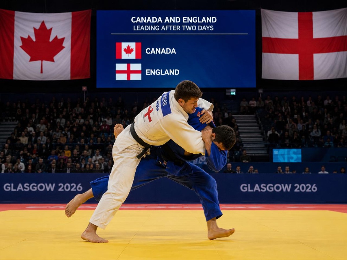 Two judoka competing at a Glasgow Commonwealth Games venue
