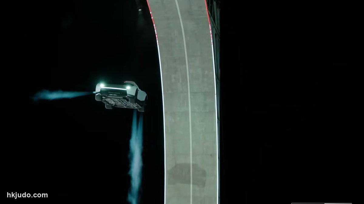 編集画像:ランプを離れて空中にあり、スラスターを噴射するTesla Roadster